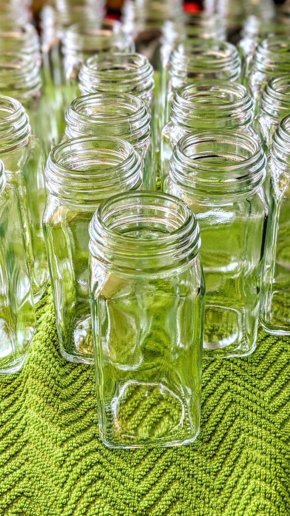 glass container with strawberries and paper towel refrigerator storage
