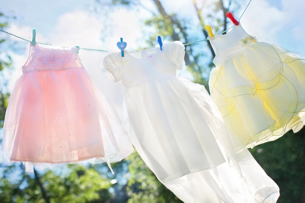 removing mold from clothes with cleaning solution