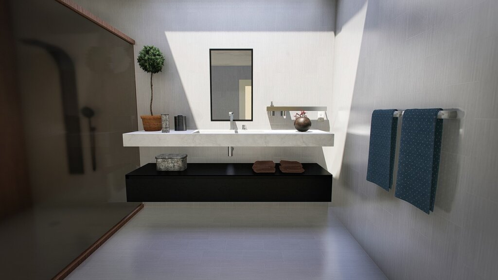 squeegee cleaning bathroom mirror after shower