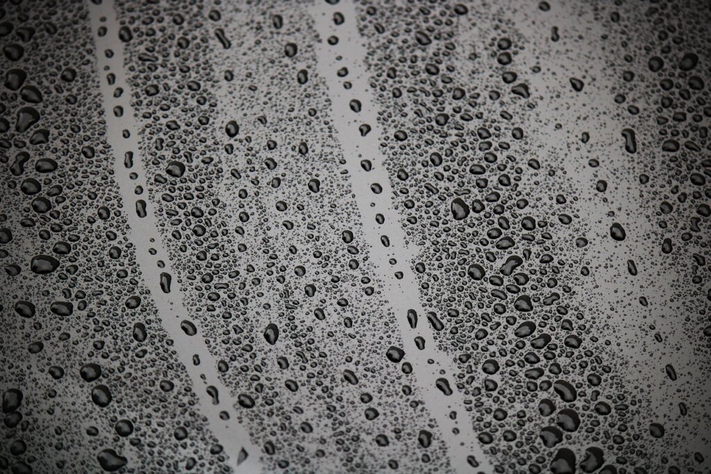 water repellent spray coating on glass surface