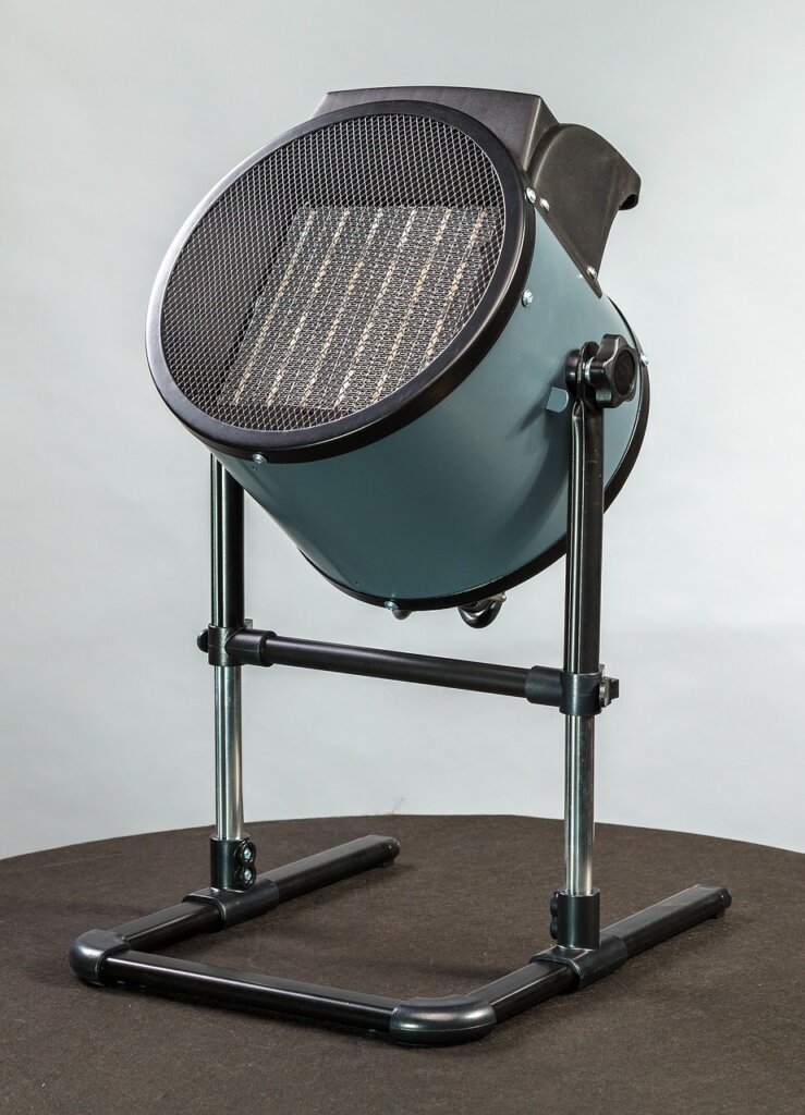 bathroom ventilation fan with mesh cover installed to block insects