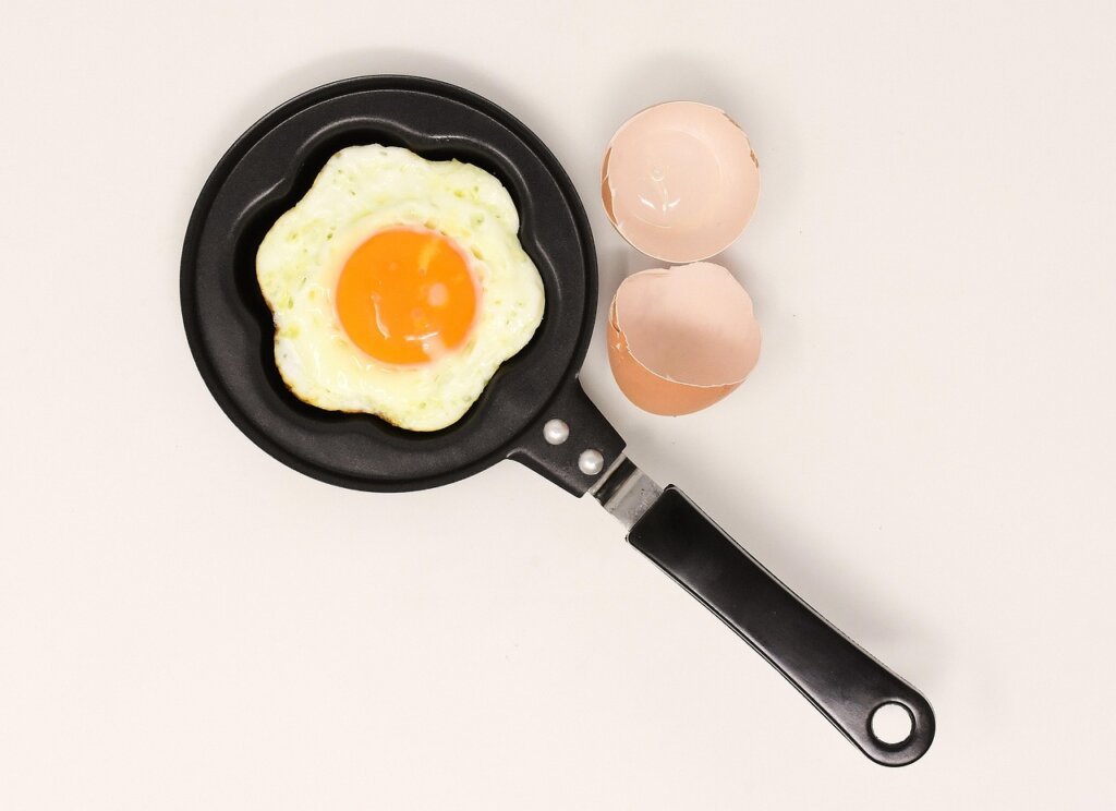 greasy frying pan before washing kitchen sink